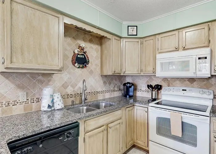 Inviting Bayfront Escape With Outdoor Seating Pool And Great Location Ocean City