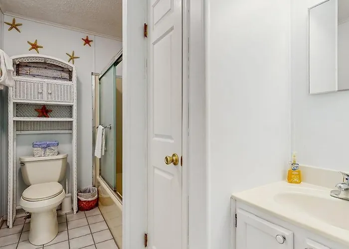 Inviting Bayfront Escape With Outdoor Seating Pool And Great Location