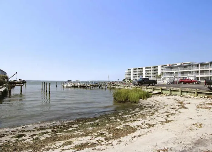 Inviting Bayfront Escape With Outdoor Seating Pool And Great Location